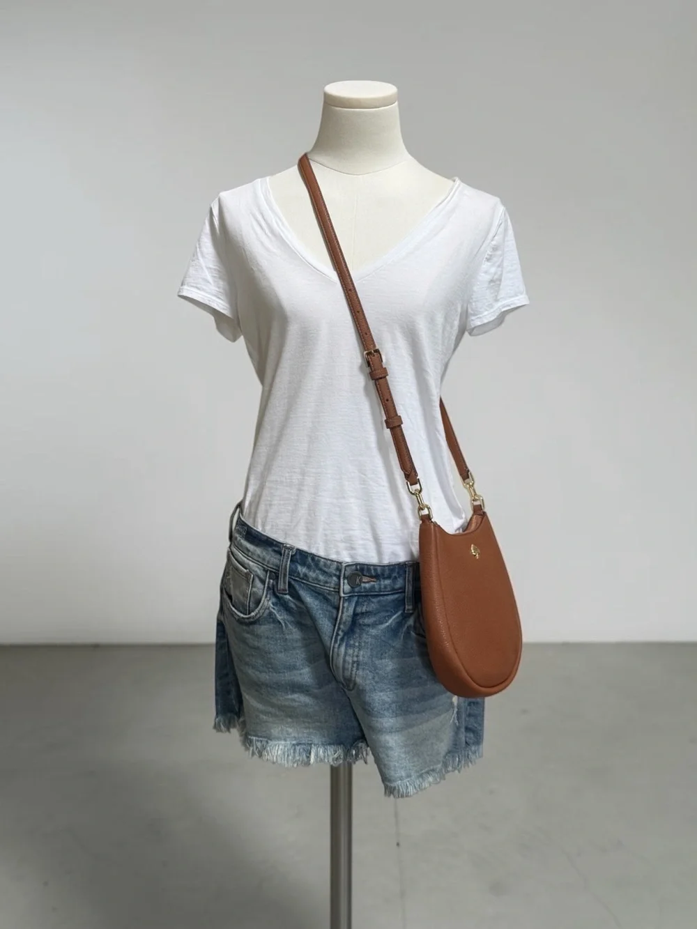 kate spade Brown Pebbled Leather Saddle Crossbody with Gold Hardware